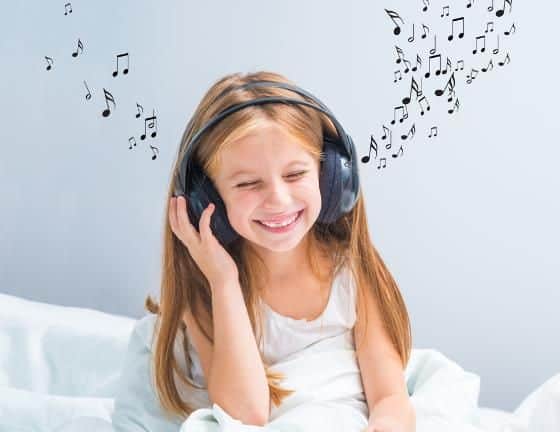 Kid listening to Songs